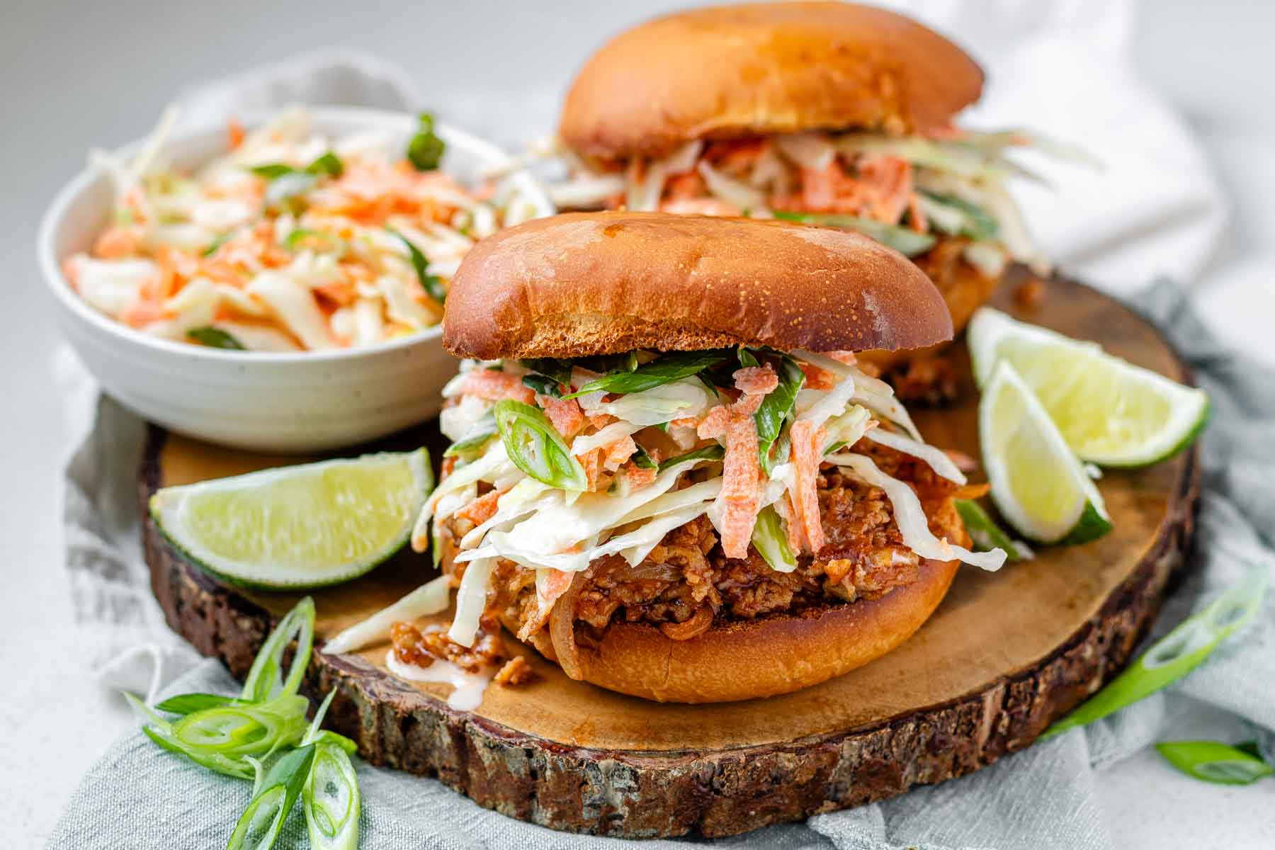Toasted buns with tofu in barbecue sauce and cabbage salad.