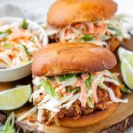 Toasted buns with tofu in barbecue sauce and cabbage salad.