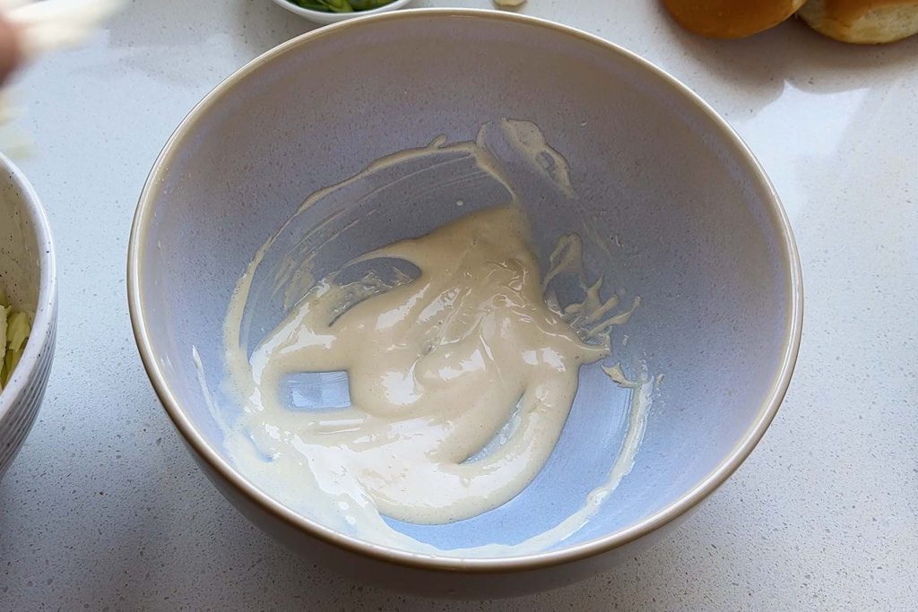 Mayo in a large mixing bowl.