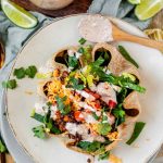 Taco salad in a tortilla bowl with the text taco salad bowls.