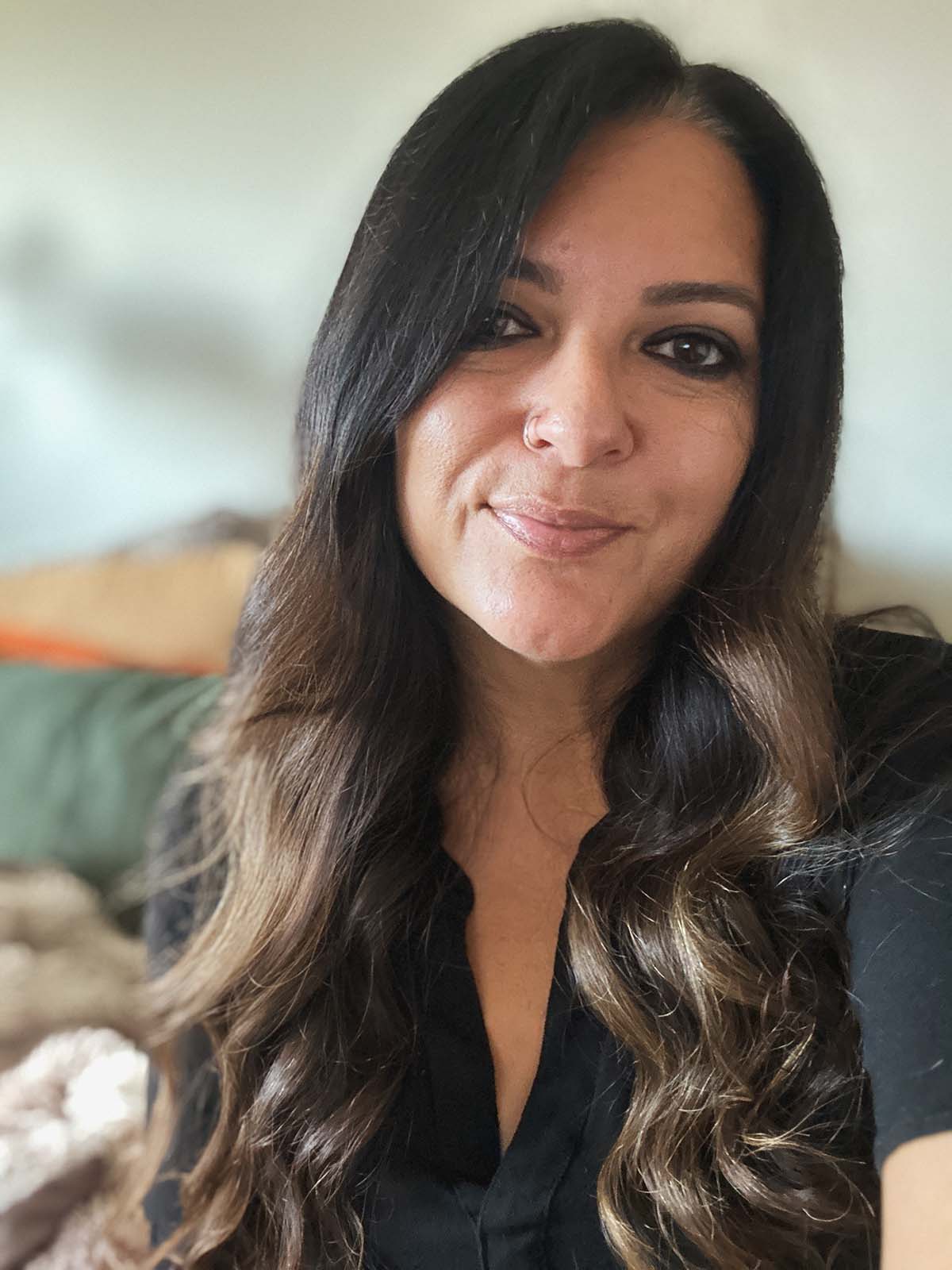 A profile photo of Jacqueline Piper, a brunette woman.