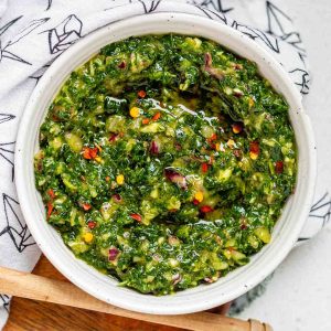 Green chunky sauce in a bowl.