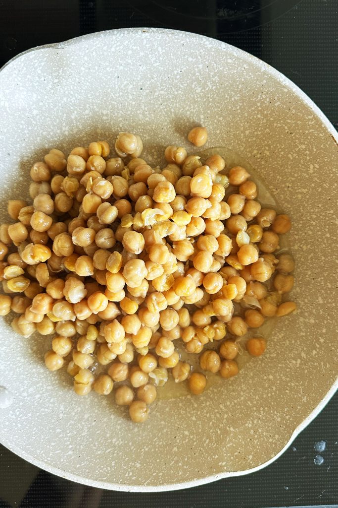 Chickpeas in a small skillet.