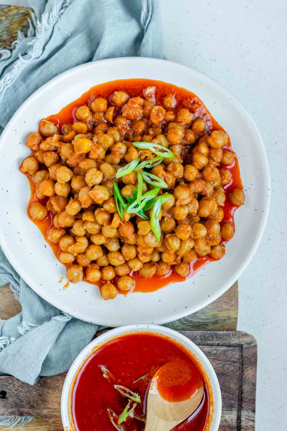 Chickpeas in red sauce in a bowl.