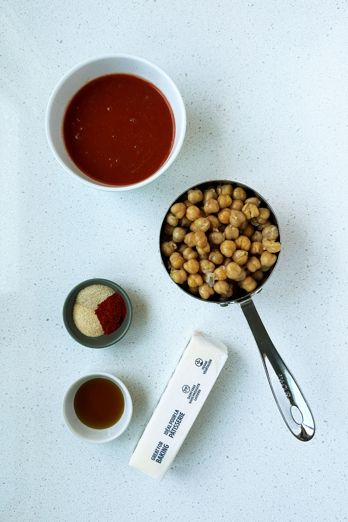 Ingredients on a counter for a buffalo chickpeas recipe.